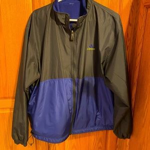 Amazing Adidas Zip Up Blue with Neon logo. Has a retro feel. Reversible!